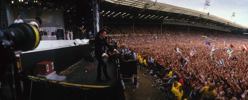 Bono Live Aid koncertā Vemblija stadionā. Londona, 1985. gads.
