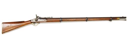 4. attēls: vienas patronas 1867. gada parauga Snaidera sistēmas .577 kalibra (14,7 mm) šautene ar šarnīra veida bloka aizslēgu, ražota Lielbritānijā, Enfīldas ieroču rūpnīcā (The Royal Small Arms Factory Enfield) pēc 1867. gada.