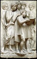 Lukas della Robija (Luca della Robbia) veidotais marmora reljefs ar koristiem "Koris" (La Cantoria, 15. gs.) Operas un katedrāles muzejā (Museo dell'Opera del Duomo) Florencē. Itālija, 21. gs.