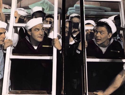 Džīns Kellijs un Frenks Sinatra filmā "Enkurus pacelt". ASV, 1945. gads.