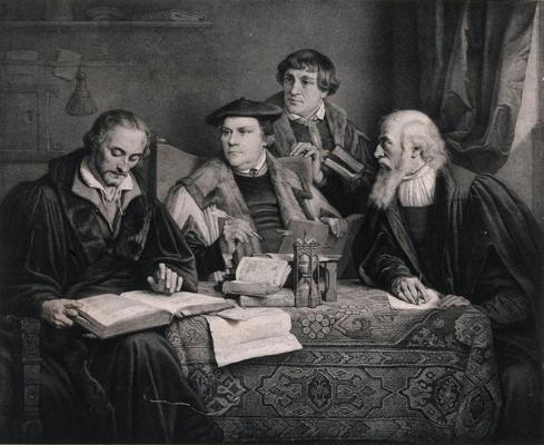 Protestantu teologi strādā pie Lutera Bībeles tulkojuma. No kreisās: Filips Melanhtons (Philipp Melanchthon), Mārtiņš Luters (Martin Luther), Johanness Bugenhāgens (Johannes Bugenhagen, arī Doctor Pomeranus), Kaspars Krucigers (Caspar Cruciger der Ältere, arī Kreutzer). 