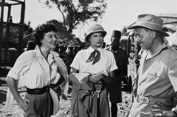No kreisās: Eiva Gārdnere, Greisa Kellija un Klārks Geibls filmas “Mogambo” uzņemšanas laikā. 1953. gads.
