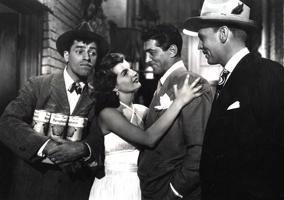 No kreisās: Džerijs Lūiss, Korīna Kalveta (Corinne Calvet), Dīns Mārtins un Džons Lunds (John Lund) filmā "Mana draudzene Irma dodas uz rietumiem" (My Friend Irma Goes West). 1950. gads.